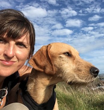 Reflexologist Lucy Evans with her dog